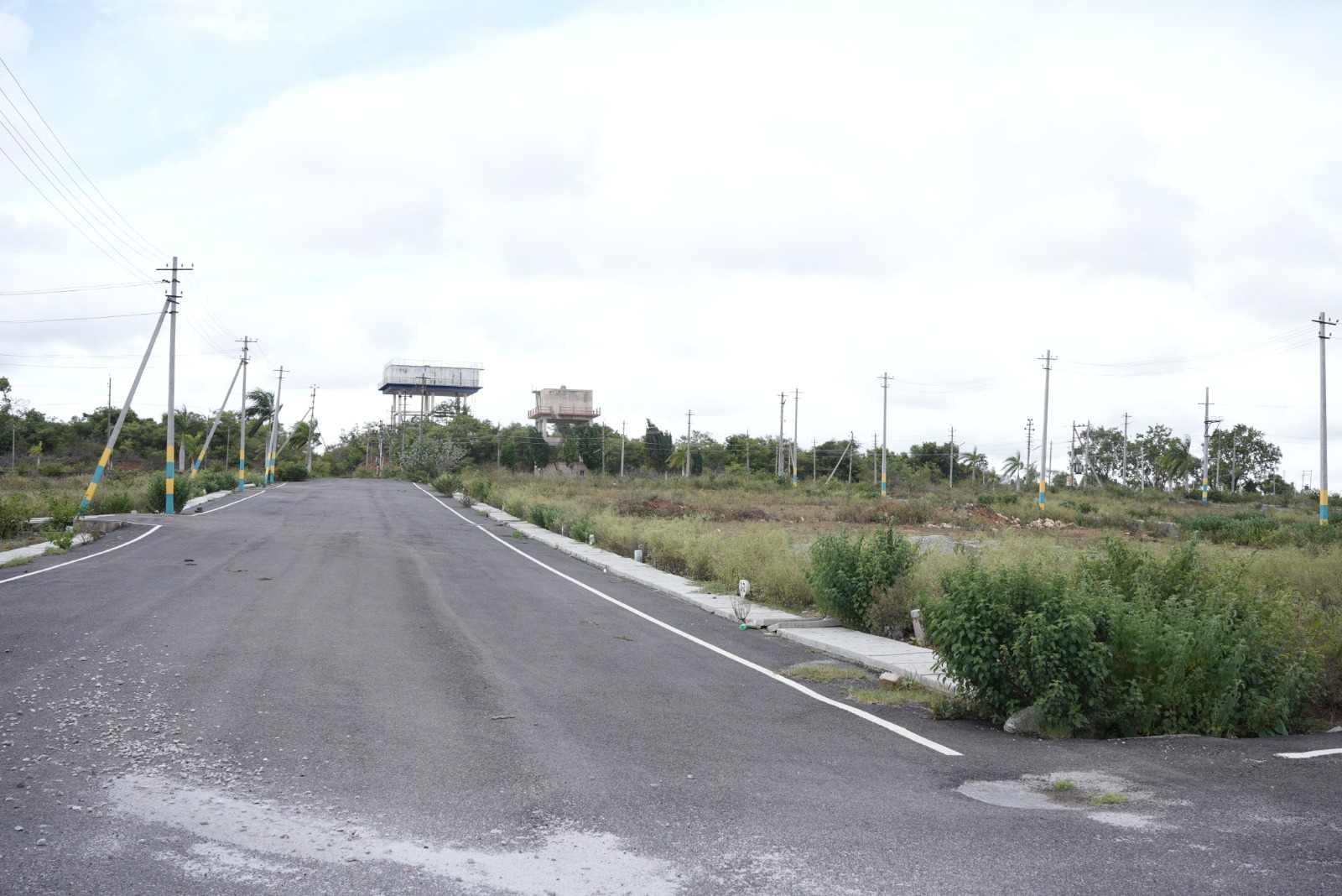 Dhanya's Aashraya asphalted internal road plots Mysore