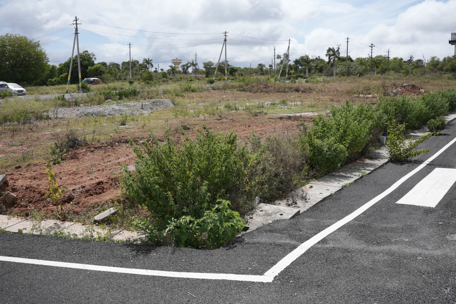 Dhanya's Aashraya asphalted internal road plots Mysore