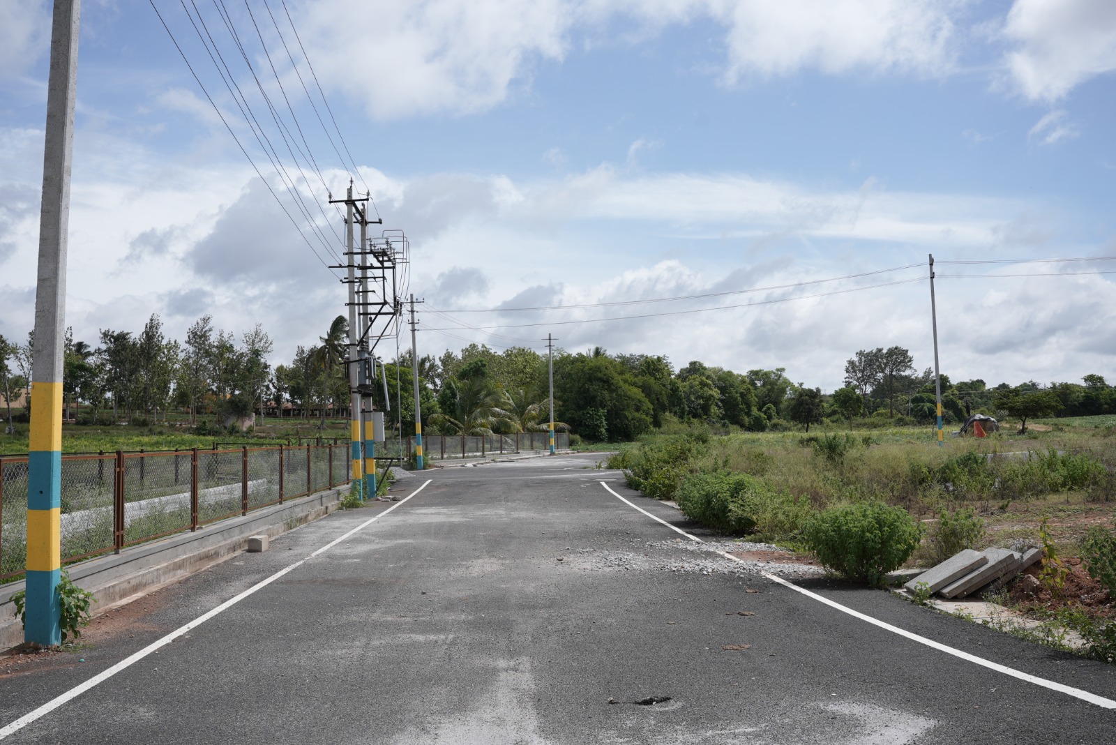 Dhanya's Aashraya asphalted internal road plots Mysore