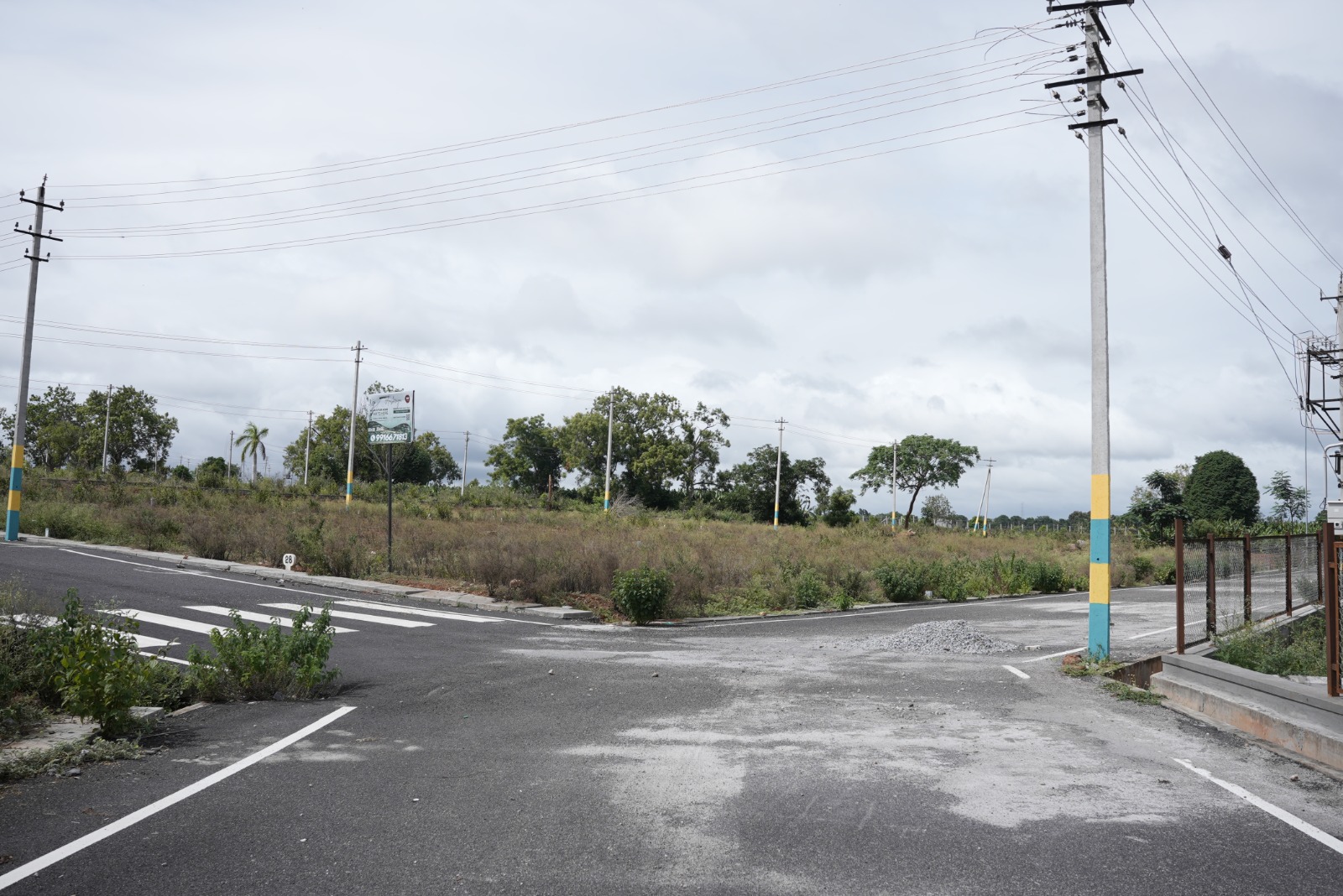 Dhanya's Aashraya asphalted internal road plots Mysore